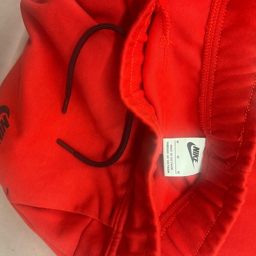 Nike Tech red pants